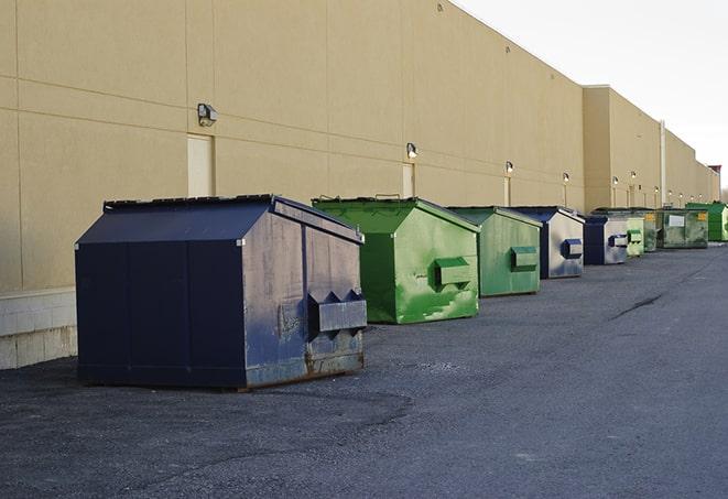 dumpsters lined up waiting to be filled with construction waste in Elm Grove